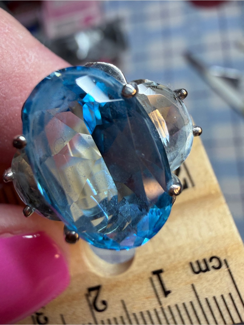 Blue Topaz Oval Cocktail Ring with two light topaz stones